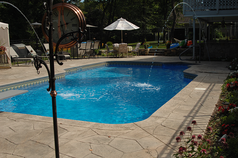 Swimming pool and stamped concrete project example 115